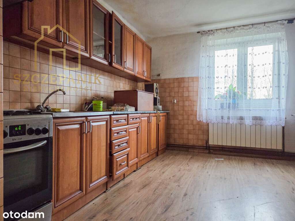 Urokliwy Dom z cegły na pięknej 25 arowej działce-4