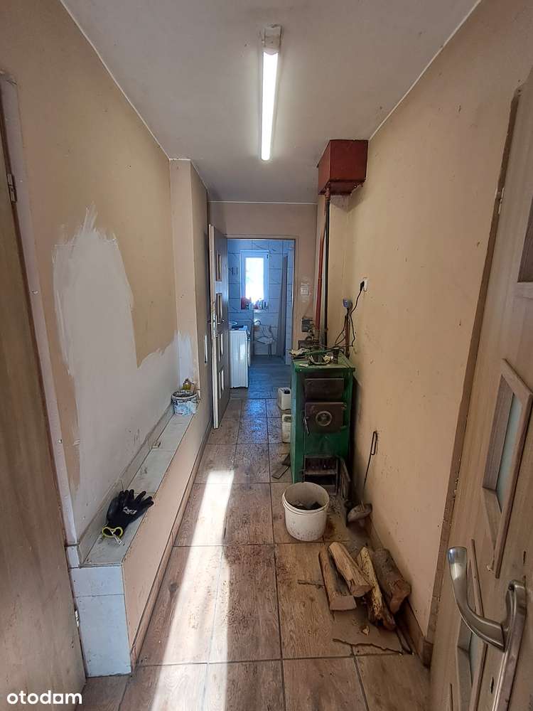 Parterowy murowany dom z dużym garażem-11