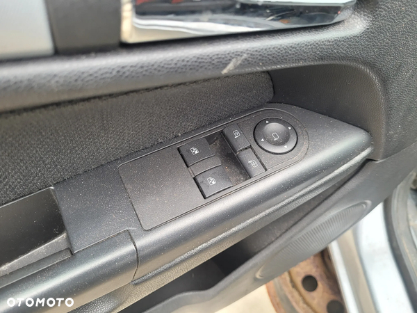Panel przełącznik lusterek szyb lewy Opel Astra H III 2005r Europa 3d hatchback GTC - 1