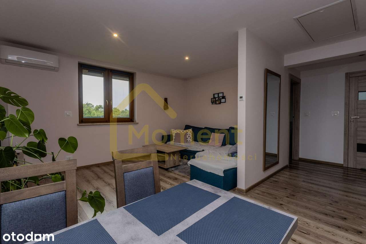 Ekonomiczny dom z garażem i pięknym ogrodem-18