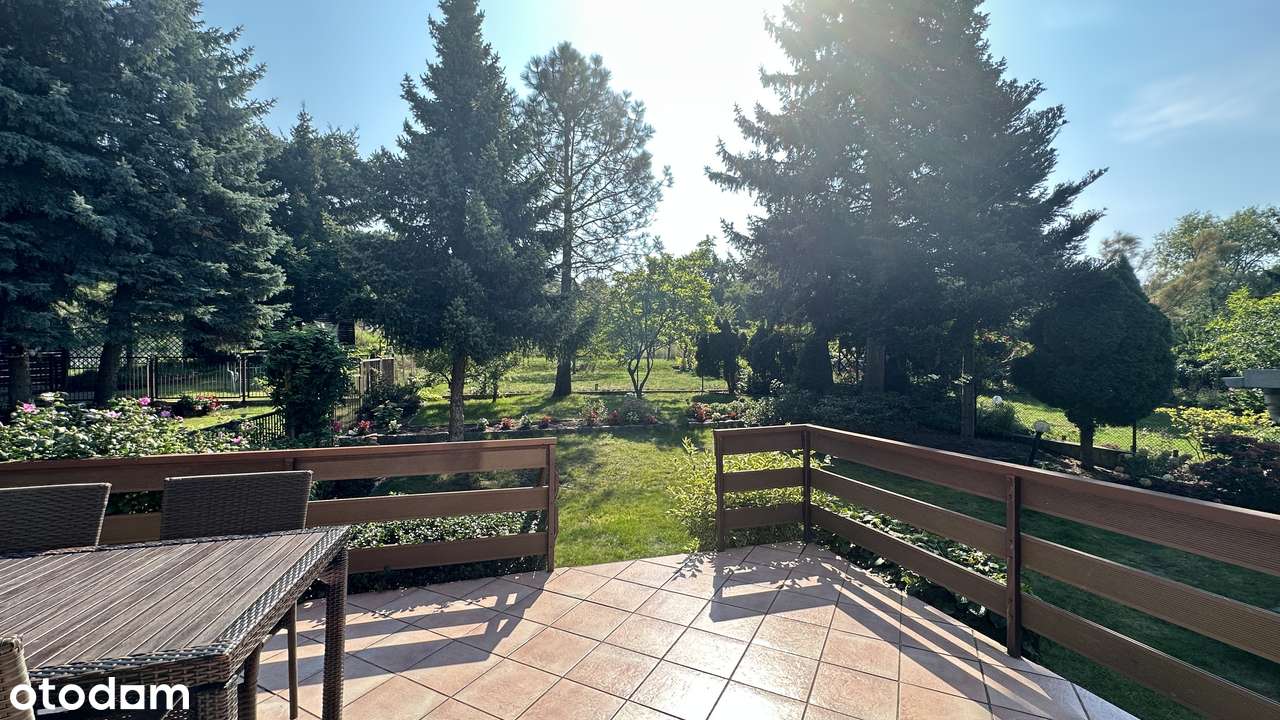 Pół bliźniaka 108 m kw z tarasem, pięknym ogrodem, piwnicą i garażem.-1