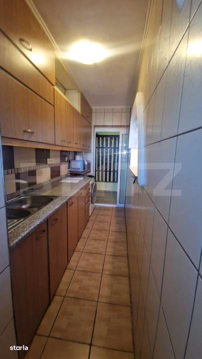 Garsoniera mobilata, etaj intermediar, parcare, beci luminoasa - Imagine principală: 2/13