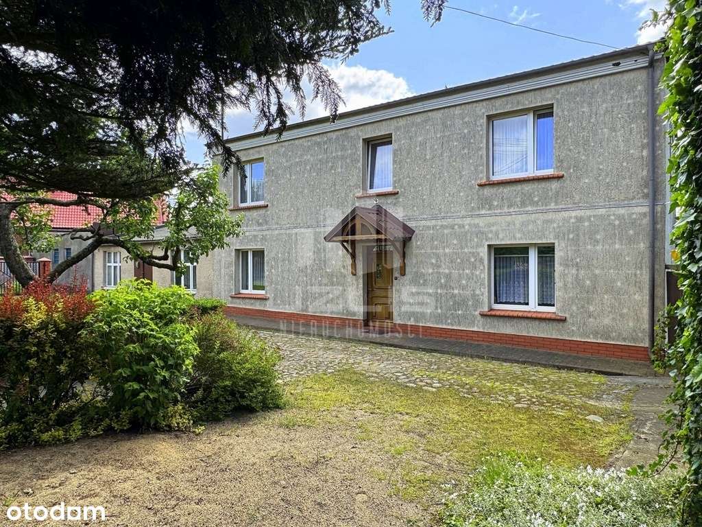 Dom z budynkami gospodarczymi w sercu Skarszew-6