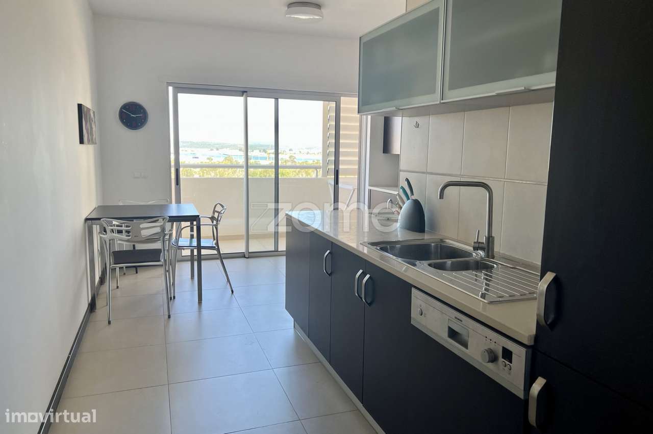 Apartamento T2 com Vista Rio e Rooftop Exclusivo na Praia da Rocha - Grande imagem: 3/27