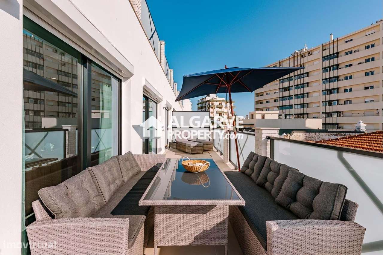 Moderno T2 no Centro de Faro com Garagem e Excelentes Acessos - Grande imagem: 1/27