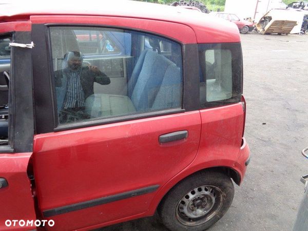 FIAT PANDA II 2 BŁOTNIK LEWY TYLNY GOŁY - 1