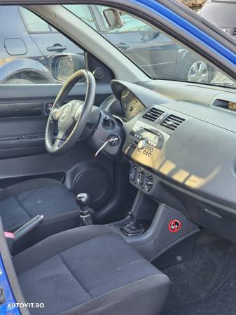 Suzuki Swift 1.3 Club - 13