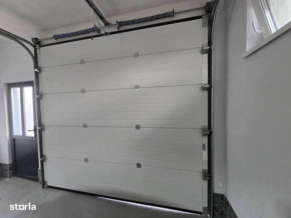 Vila 4 camere, Garaj, 2 bai, SU 210mp, teren 1000mp, CIURBESTI lac-14