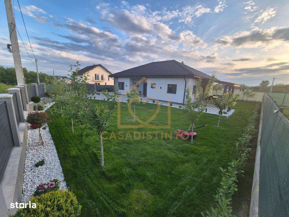 Casa pe nivel cu garaj si 6 ari teren in Sasar - Imagine principală: 2/12