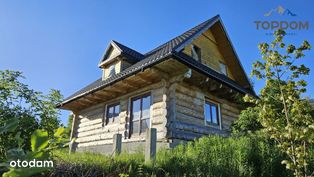 Drewniany dom do dokończenia w góralskim stylu