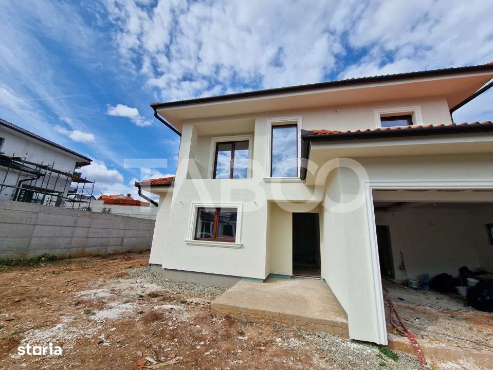 Casa individuala de vanzare cu teren, terasa, garaj si curte Selimbar - Imagine principală: 3/19