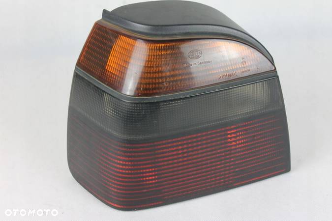 Lampa lewy tył VW Golf III 3 HB tylna lewa lampy OE Hella - 2