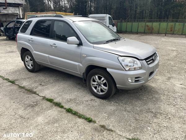 Dezmembrez Kia Sportage II 2.0 i 16V 2WD G4GC 104 kW 141 CP Euro 4 Gri an 2006 - 8