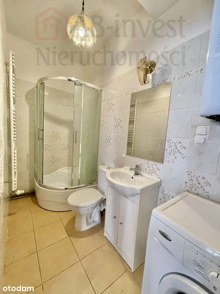 Kawalerka z miejscem postojowym na zamkniętym os.-8