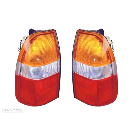 FAROLINS PARA MITSUBISHI L200 K74 96-06 - 1