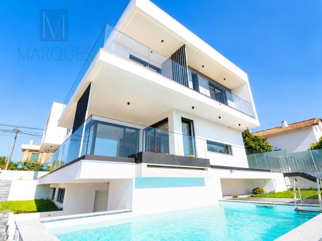 Moradia T5 com 4 Suites, Jardim e Piscina na Charneca da Caparica-25