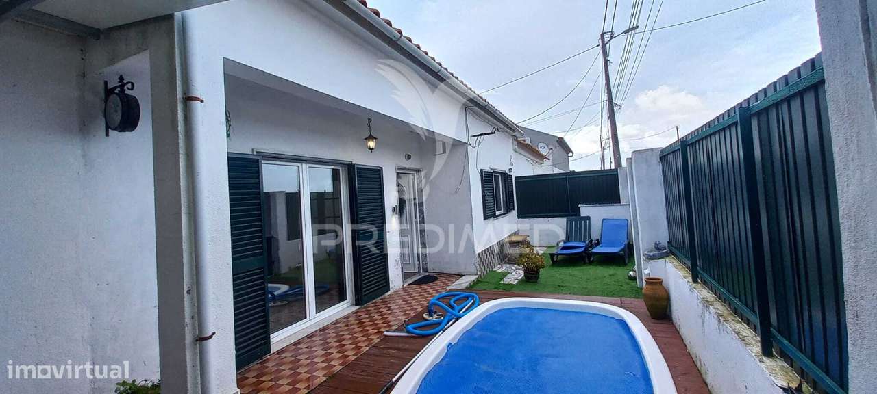 MORADIA T2 CONVERTIDO EM T1 COM GARAGEM NA CARREGUEIRA-PINHAL NOVO - Grande imagem: 2/20