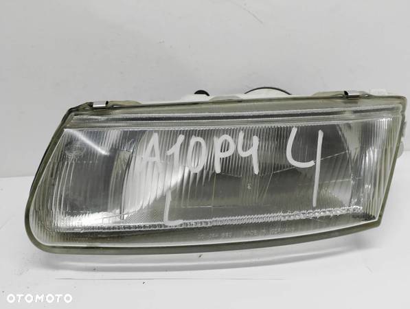 MITSUBISHI CARISMA I LAMPA REFLEKTOR LEWY PRZÓD HELLA - 1