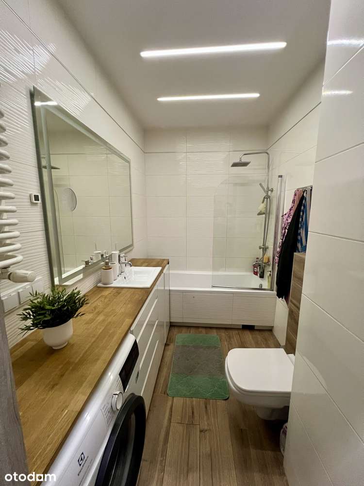 Dwupokojowe mieszkanie, oddzielna jasna kuchnia, dwa garaże - Pełny obrazek: 4/6