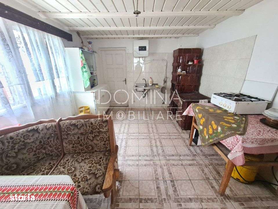 Vanzare casa cu teren generos, in centrul comunei Musetesti - Imagine principală: 4/10