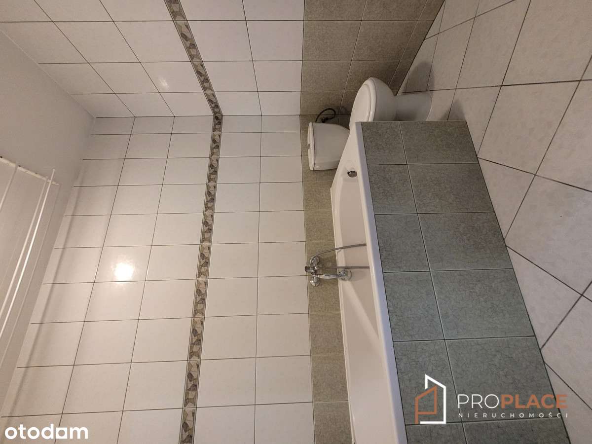 Rezerwacja - przestronna kawalerka z nową kuchnią-8