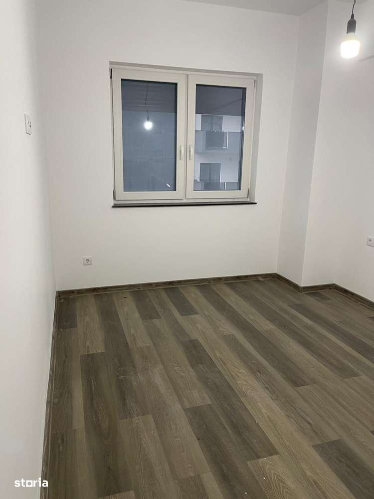 Apartament 2 cam dec, bucatarie separata etaj 1 cu parcare subterana-3