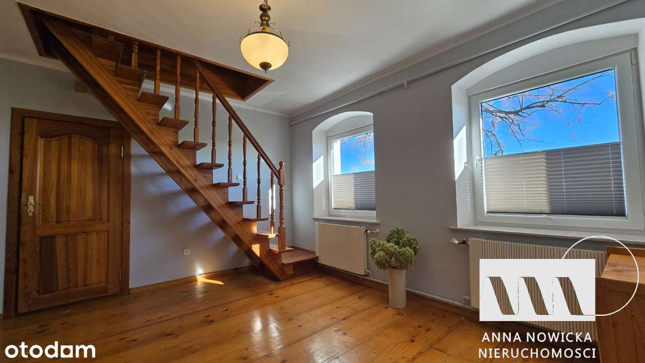 mieszkanie z ogrodem, garażem i pomieszczeniami gospodarczymi-0