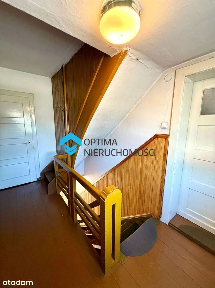 Dom z potencjałem w spokojnej dzielnicy-11