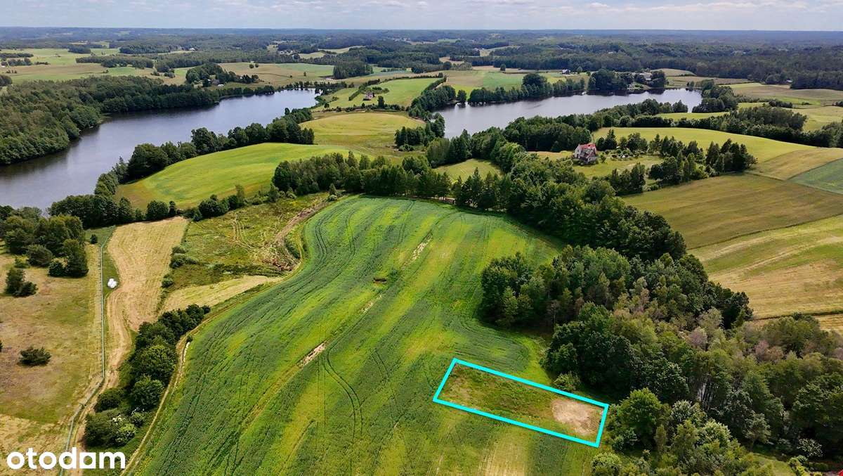 Bajeczna działka budowlana otoczona czterema jeziorami i gęstym lasem.-3