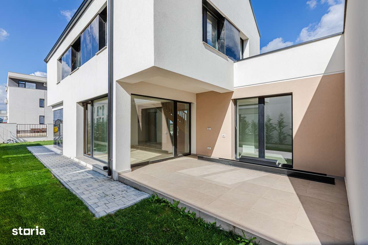 Casa Modernă cu Spații Vitrate Generoase - Imagine principală: 5/20