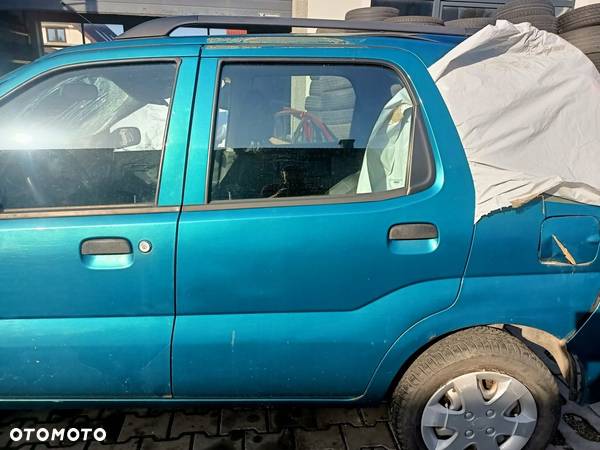 DRZWI LEWY TYŁ SUZUKI IGNIS SUBARU JUSTY 03-08 ZD8 - 1