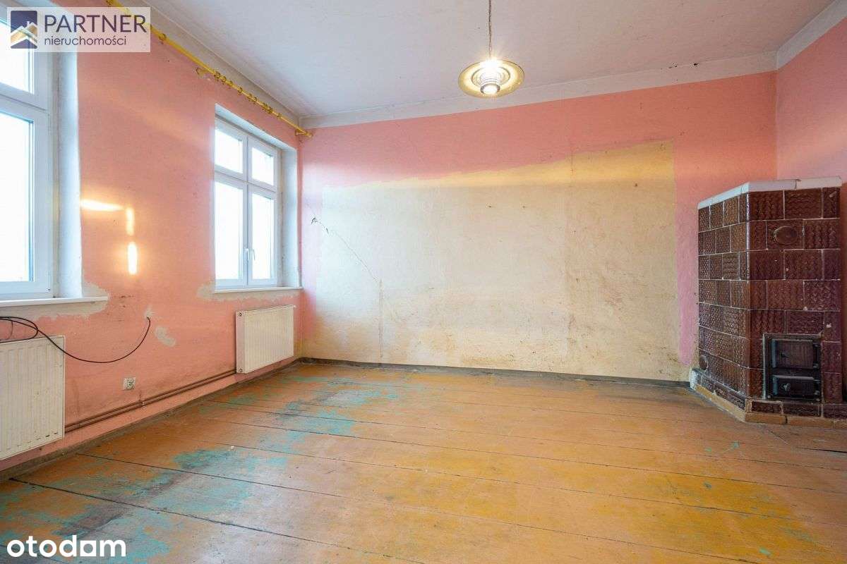 Dom z zabudowaniami na dz. 4 400 m2 (udział 1/2)-1