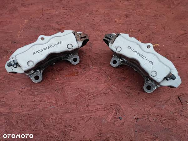 PORSCHE CAYENNE 9P 7L ORYGINALNE ZACISKI HAMULCOWE TYŁ LEWY / PRAWY BREMBO V8 4.5 4 TŁOKOWE O NR. 20 7673 03 OEM Q7 / VW TOUAREG - 4