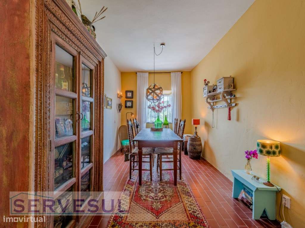 Charmosa moradia de 2 quartos de 121 m², inserida num terreno com 2...-9