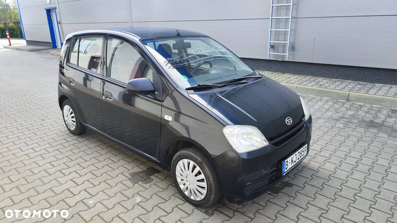 Daihatsu Cuore 1.0 Plus - 12