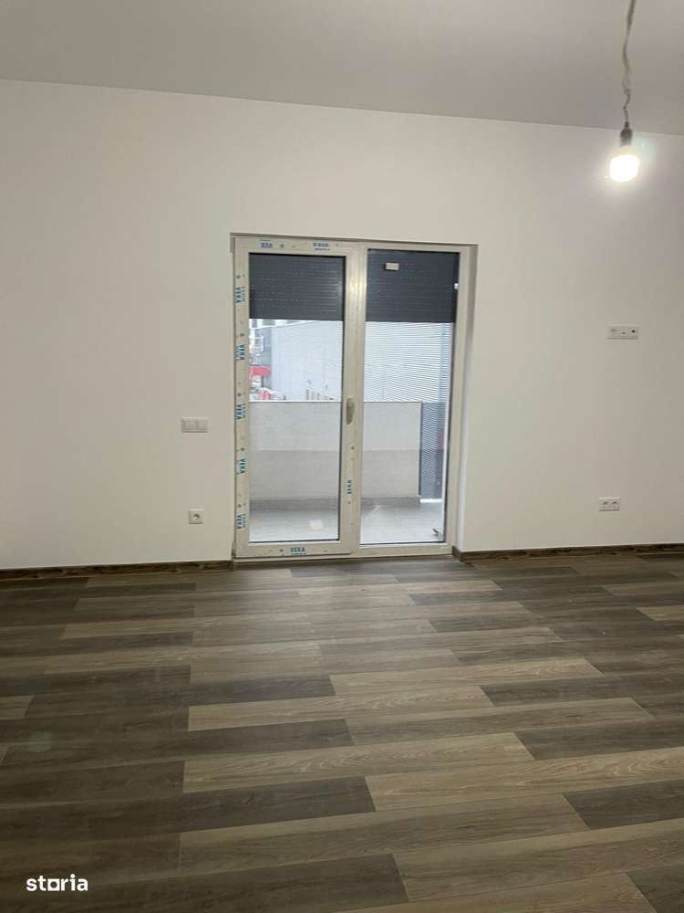 Apartament 2 cam dec, bucatarie separata etaj 1 cu parcare subterana-5