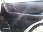 FORD MAVERICK ESCAPE TAPICERKA DRZWI PRZEDNIE TYLNE KOMPLET 4 SZT oryginal czesci rozne - 4