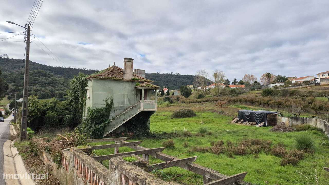 Casa em lote urbano mais 02 rústicos urbanizáveis com área total de...-8