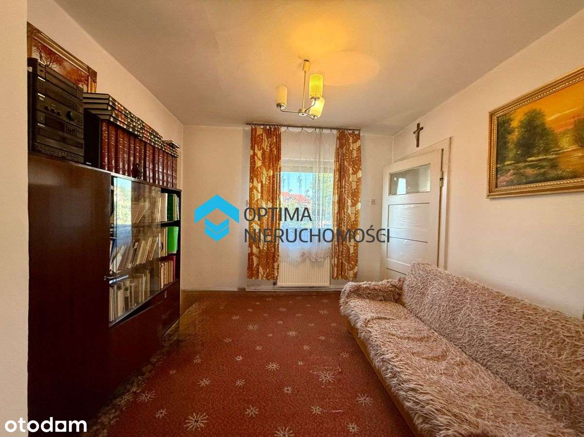 Dom z potencjałem w spokojnej dzielnicy-15