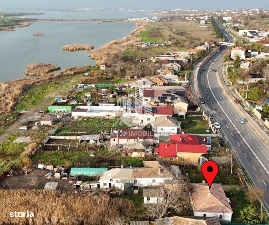 Teren intravilan 1052mp cu casa renovabila de cărămidă Tuzla-1
