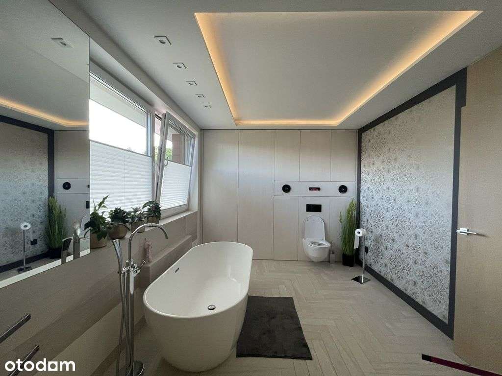 Nowoczesny dom z garażem, pompą ciepła i solarami-13