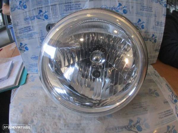 Farol Far1574 JEEP CHEROKEE KJ 2006 2.8D 165CV 5P DOURADO ESQ H4 DAIMLER - 1