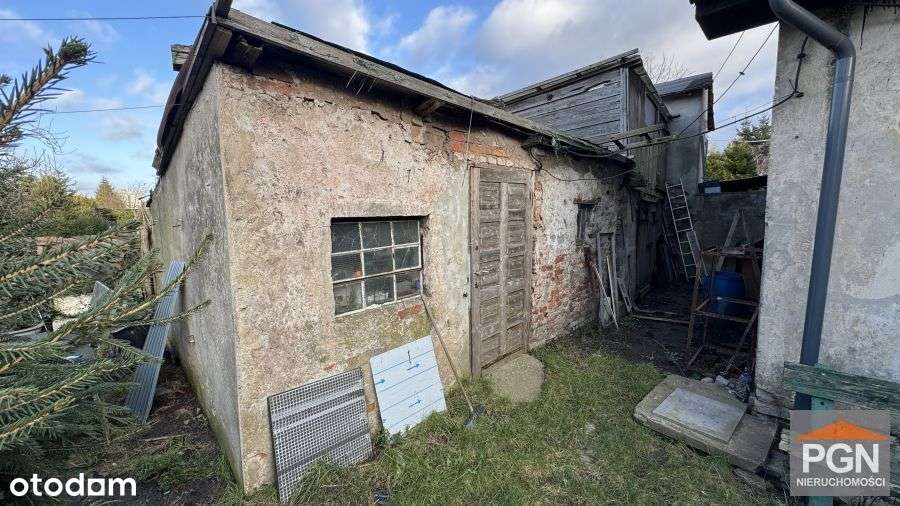 Połowa domu blisko centrum z działką-14