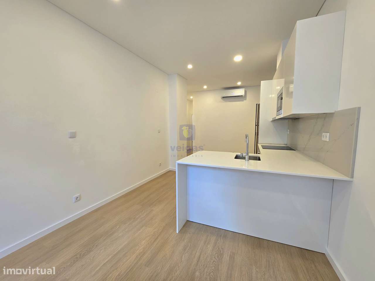 Apartamento T2 com terraço com duas frentes ao nível do RC no empreend - Grande imagem: 4/21