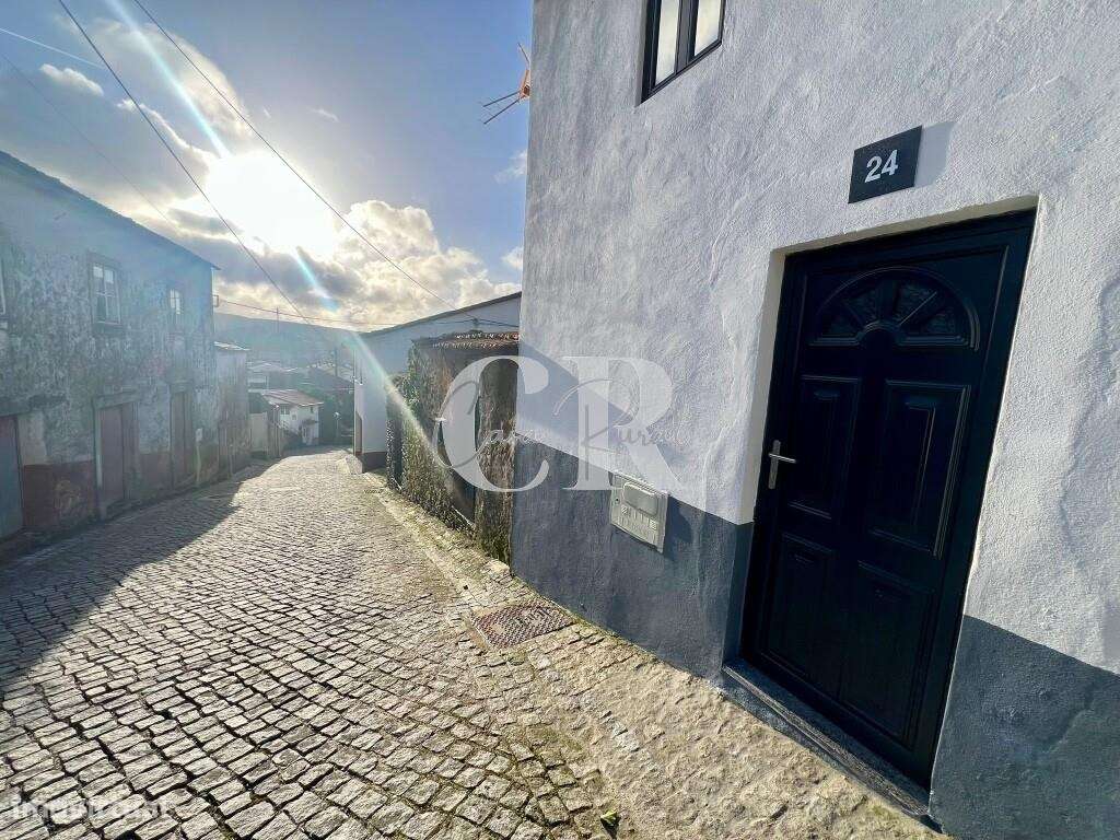 Moradia acolhedora no centro histórico com potencial de investimento - Grande imagem: 4/22