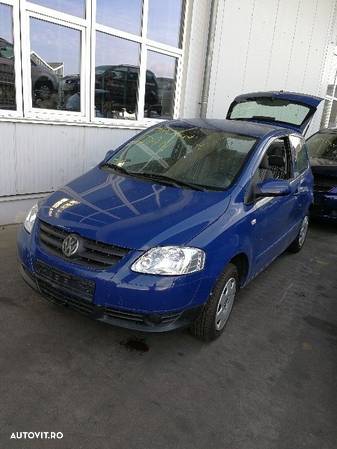 Dezmembrez VW Fox 1.4tdi BNM volan stanga motor cutie far bara servo - 1