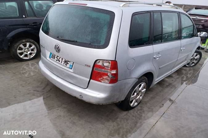 Airbag volan / sofer Volkswagen VW Touran 1  [din 2003 pana  2006] seria Minivan 2.0 TDI MT (136 hp - 4