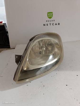 farol óptica esquerdo Opel Vivaro 2003 - 1