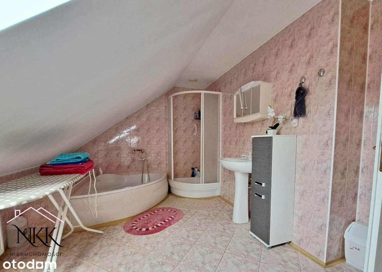 Rodzinny dom z pięknym ogrodem, stawem i 2 garażami -Lubniewice-18