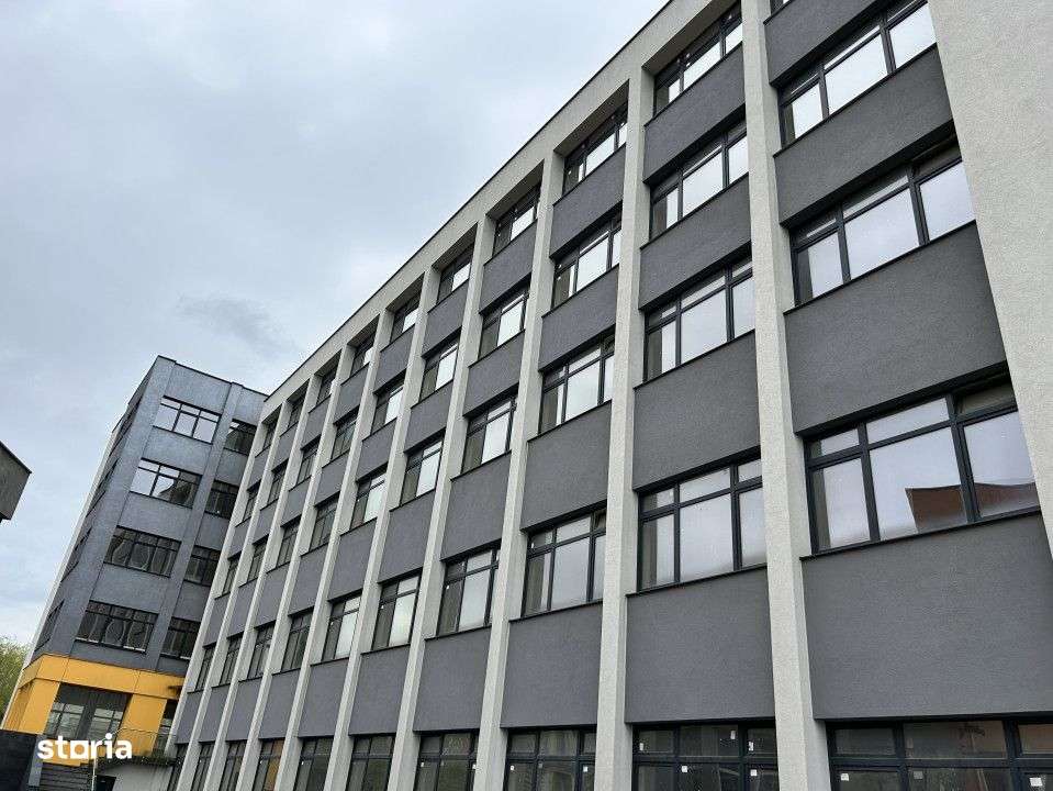 Cladire de vanzare D+P+4 cu 4670mp utili si curte 3650mp la 1280euro/m - Imagine principală: 5/16